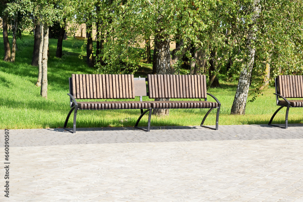 Landscape design. Beautiful benches in the park Landscape design. Beautiful benches in the park