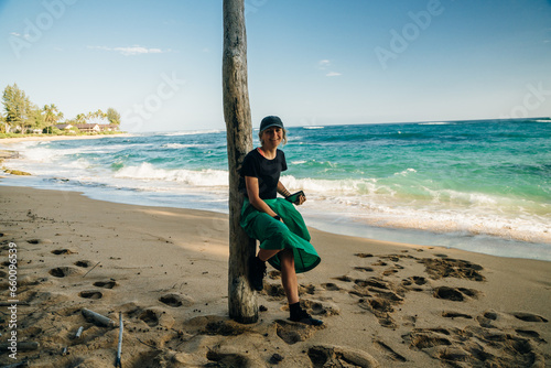 woman on Tropical exotic beach in Haena, Kauai Island, Hawaii photo