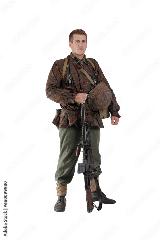 Male actor in the uniform of a German army soldier during World War II with a machine gun