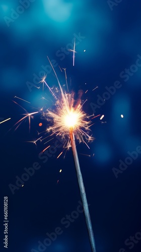 Holding a sparkler for independence day  holidays or new years eve.