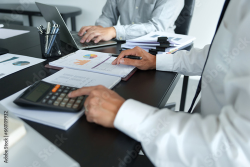 Business Professional Chartered Accountant Woman working with computer and calculator Sales Invoice Accounting.