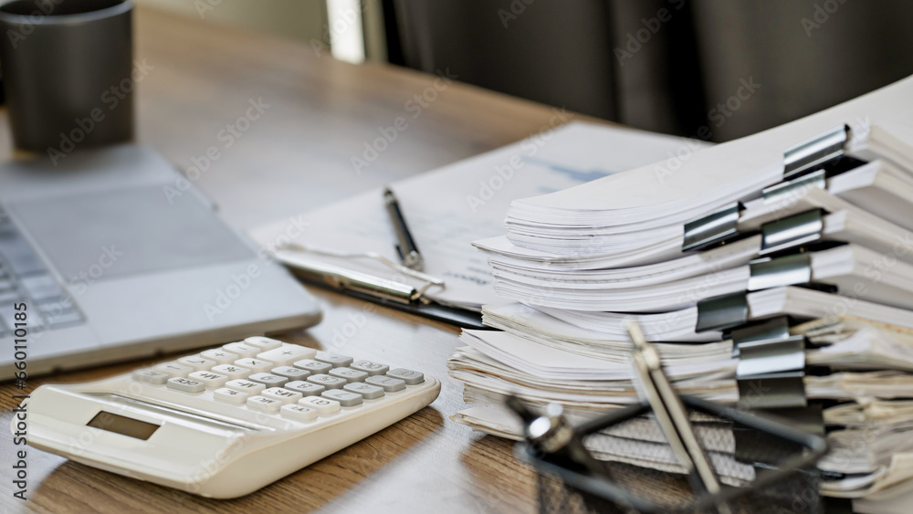 stack of paperwork with unfinished documents achieves. stack of paperwork with unfinished documents achieves.
