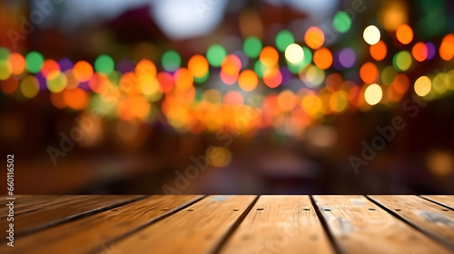 Empty wooden table with colorful bokeh lights, Latin festival background. Space for advertising, brand or product