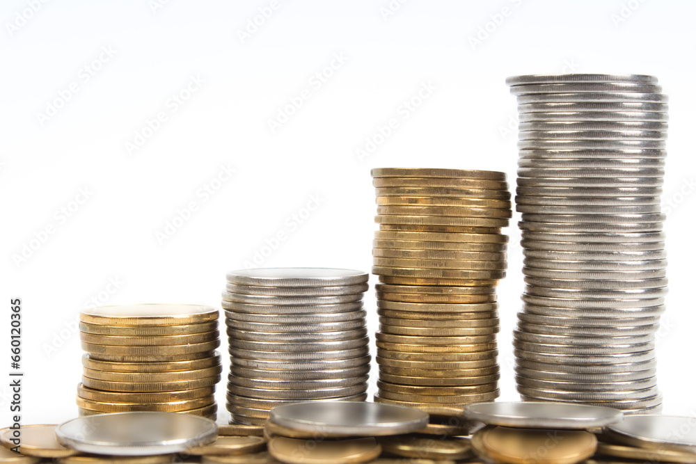 Gold towers made out of gold and silvery coins, stack isolated on white. Gold towers made out of gold and silvery coins, stack isolated on white.