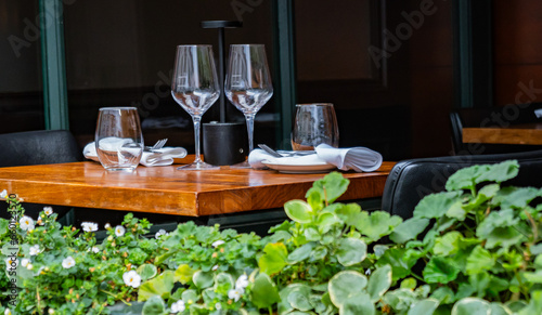 table set for dinner in open restaurant on city street in Montreal, Canada
