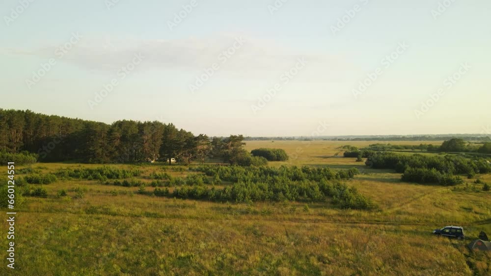 Landscape view from drone, yellow and green fields and haystacks Landscape view from drone, yellow and green fields and haystacks
