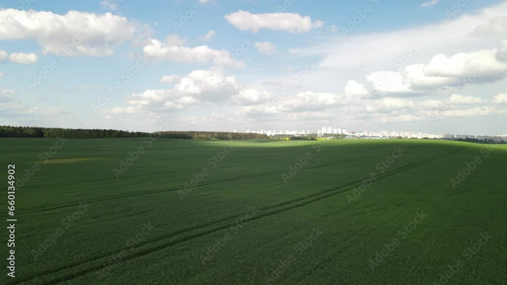 Aerial view of the green fields and landscape. Agricultural view on a summer day. Aerial view of the green fields and landscape. Agricultural view on a summer day.