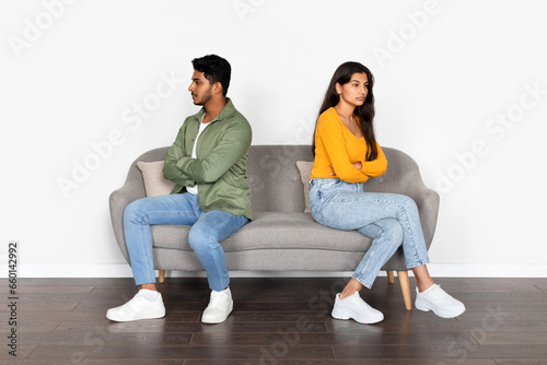 Offended indian couple ignoring each other post-quarrel