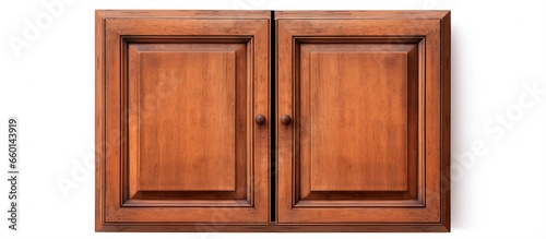 Brown wall cabinet with clipping path on white background © Lasvu