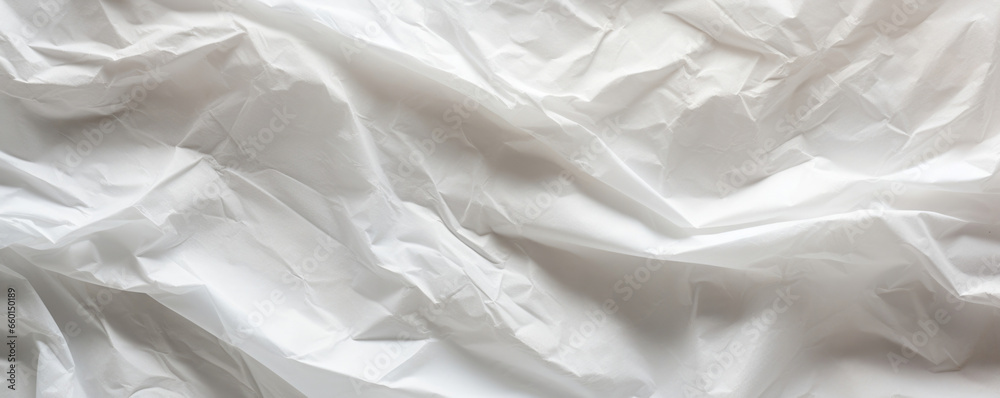 Closeup of a crinkled tracing paper texture, showcasing its lightweight and flexible nature with a crinkled, almost wrinkled appearance. Closeup of a crinkled tracing paper texture, showcasing its lightweight and flexible nature with a crinkled, almost wrinkled appearance.