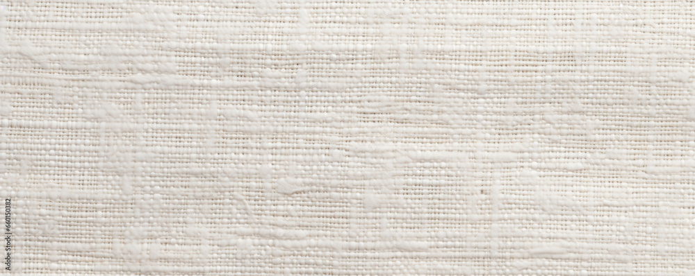 Closeup of a loosely woven cotton texture, showcasing the natural fibers and a slightly rough texture with a light sheen. - obrazy, fototapety, plakaty 