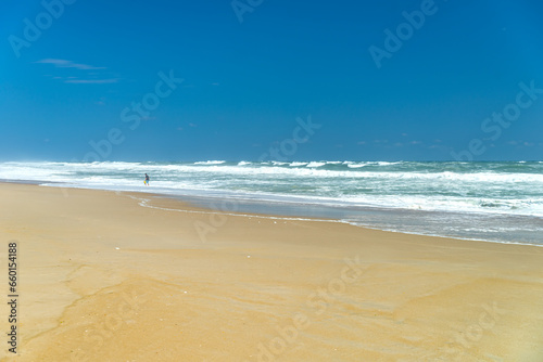 Deserted shore, waves and sky of the Atlantic Ocean