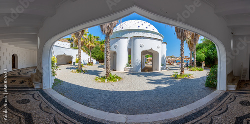 Fototapeta Naklejka Na Ścianę i Meble -  The beautiful buildings at Kalithea Springs constructed in the 1930s, Rhodes Island, Greece, Europe. Kallithea Therms, Kallithea Springs located at the bay of Kallithea on Rhodes island, Greece.