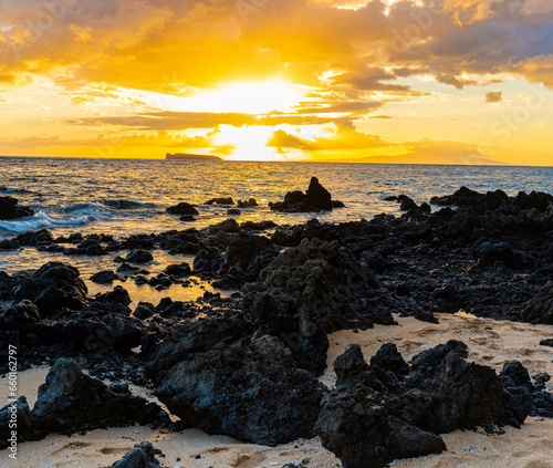 Sunset on The Volcanic Shoreline of Makena Beach, Makena State Park, Maui, Hawaii, USA photo