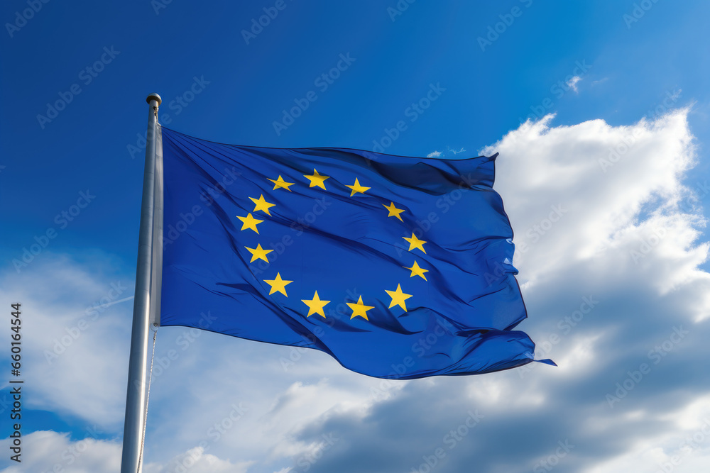 EU flag fluttering in the wind against a clear blue sky