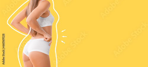 Slim young woman after weight loss on yellow background with space for text photo