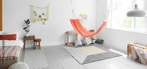 Interior of light bedroom w...