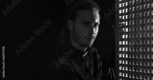 Grayscale portrait of male ...