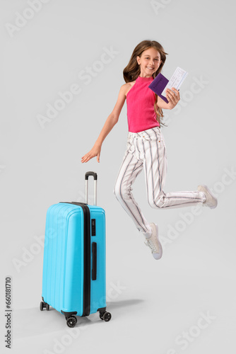 Little girl with passport, ...