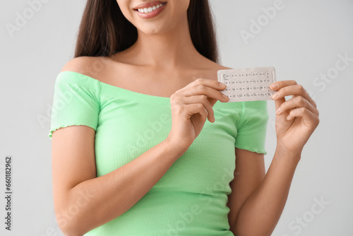 Young woman with contracept...