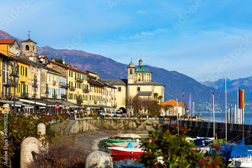 Scenic view of Cannobio lakefront promenade at sunny winter day, Piedmont, Italy