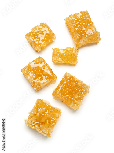 Many sweet honeycombs on white background