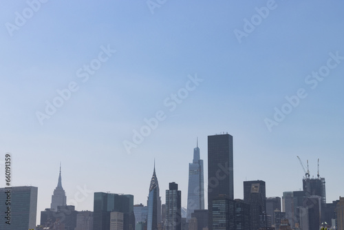 Midtown Manhattan Skyline with a Large Clear Blue Sky Background in New York City © James