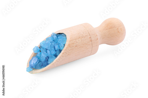 Wooden scoop with blue sea salt isolated on white