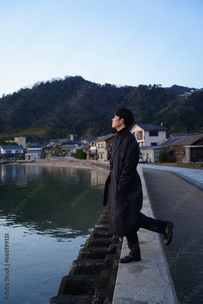 Fototapeta premium man looking at the sea