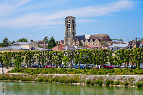 Bell tower of the late-gothic Parish Church of Saint Crépin overlooking the River Marne in the town of Château-Thierry in the French department Aisne in Picardie