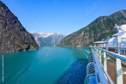 Cruise ship navigating in the narrow Tracy Arm Fjord near Juneau in southeastern Alaska, USA photo
