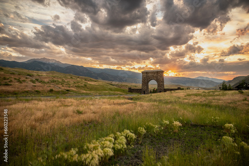 Sunset Behind Roosevelt Arch In Gardiner Montana photo