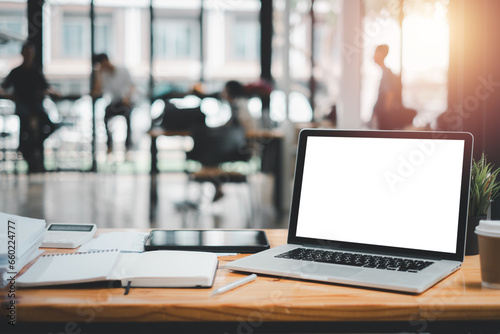 Blank screen laptop computer on office desk, Blank screen for product display.