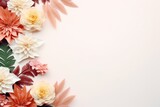 A colorful bouquet of paper flowers on a plain white background