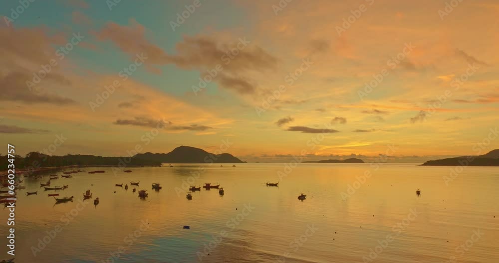 ..stunning reflection of colorful sky in the sea at Rawai beach Phuket..Imagine a fantasy colorful clouds changing in sky of sunrise..Gradient color. Sky texture, abstract nature background. ..stunning reflection of colorful sky in the sea at Rawai beach Phuket..Imagine a fantasy colorful clouds changing in sky of sunrise..Gradient color. Sky texture, abstract nature background.