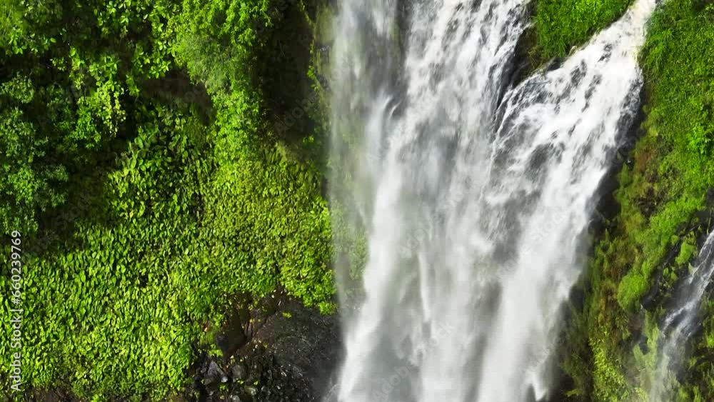 Lasang Falls with rapid stream and greenery plants. Bukidnon, Philippines. Lasang Falls with rapid stream and greenery plants. Bukidnon, Philippines.
