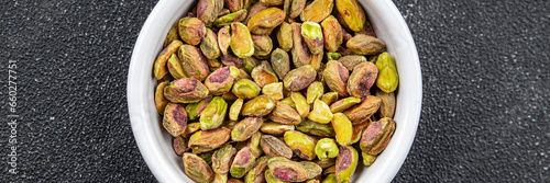 pistachios peeled without shell delicious nut eating cooking appetizer meal food snack on the table copy space food background rustic top view keto or paleo diet vegetarian vegan food