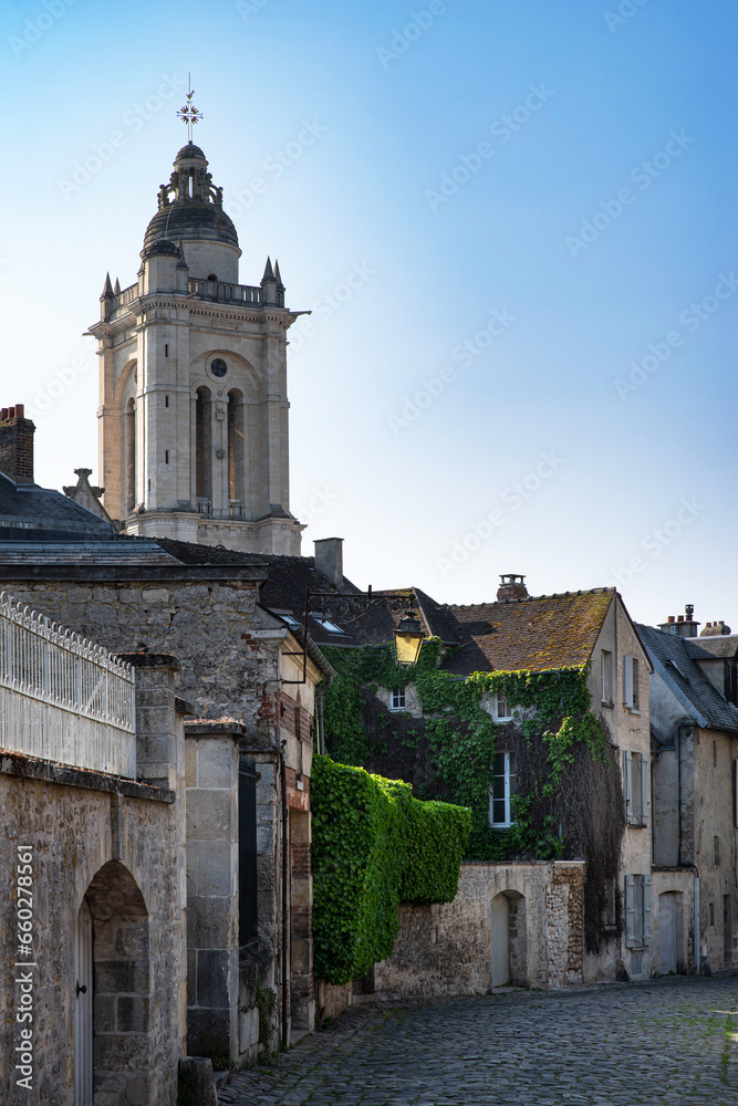 Old houses and church in the town of Senlis in France