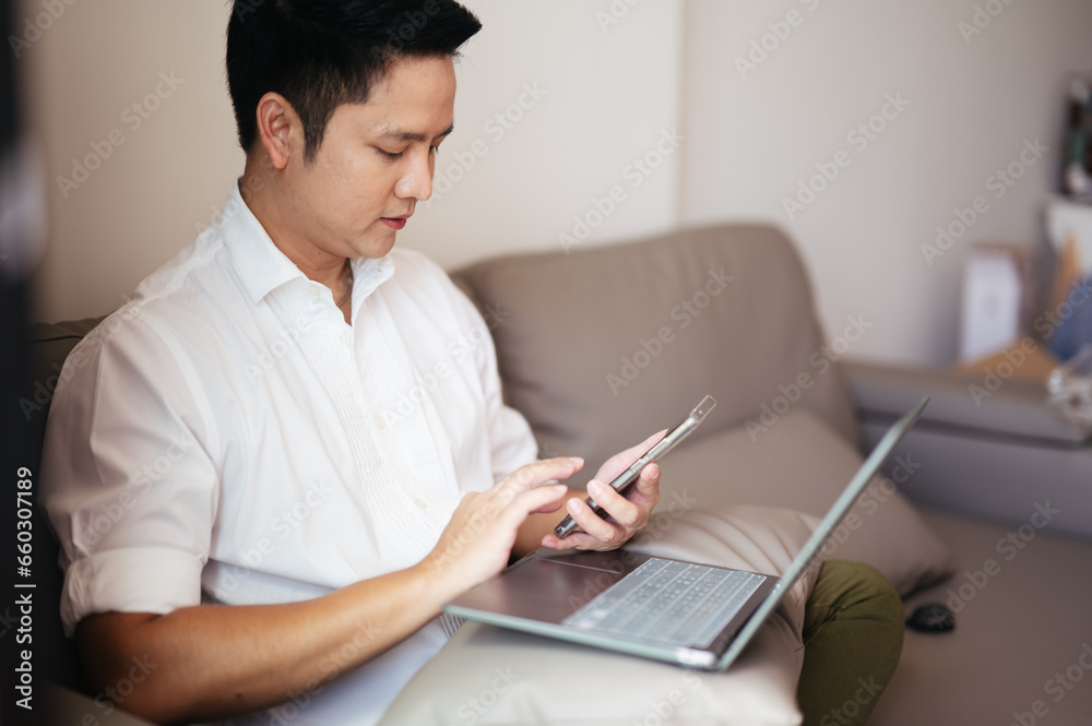 young asian business man use the smartphone. business successful technology concept. young asian business man use the smartphone. business successful technology concept.