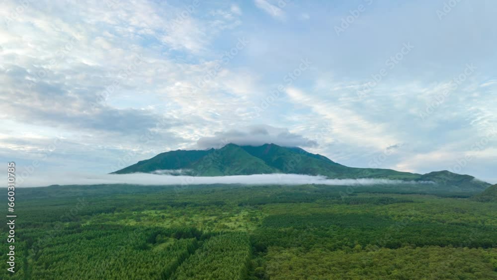 Aerial time lapse of clouds moving over Rishiri Fuji, a volcanic mountain Aerial time lapse of clouds moving over Rishiri Fuji, a volcanic mountain