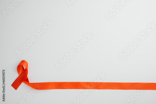 Isolated on white Red ribbon for HIV awareness on World AIDS Day, December 1. Charity, hope, and support. Give me this.