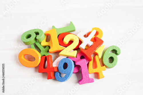Number wood block cubes for learning Mathematic, education math concept. © manassanant