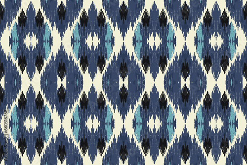 Ikat paisley embroidery on the fabric in Indonesia,India and asian countries.geometric ethnic oriental seamless pattern.Aztec style. illustration.design for texture,fabric,clothing,wrapping,carpet.
