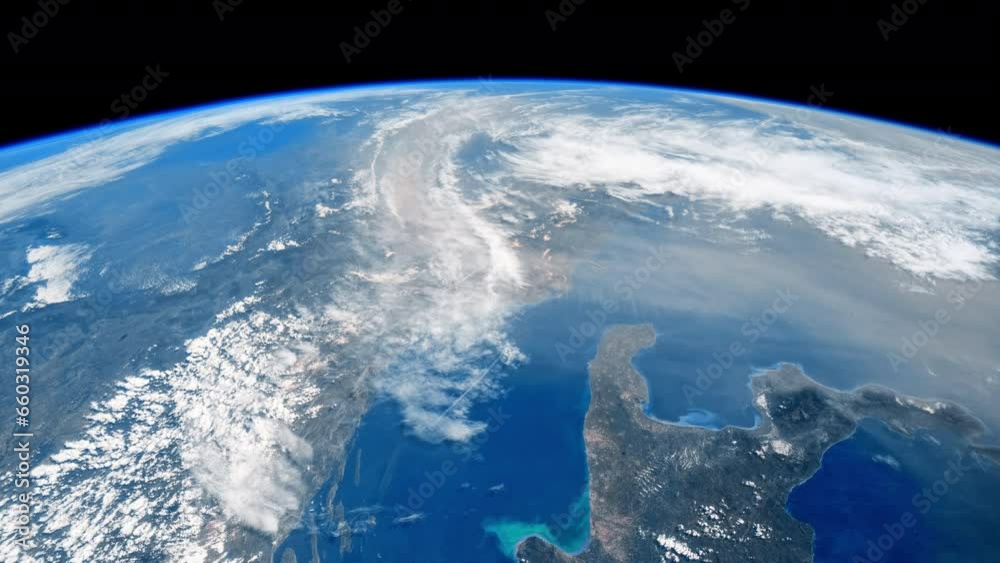 Orbiting over planet Earth. Beautiful clouds and atmosphere from above. View from International Space Station. Public Domain images from Nasa	
