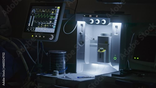 Wallpaper Mural Close up shot of moving pulmoflator and monitor screen with displayed vital signs during surgery. Medical equipment in intensive care unit. Medics work in modern operating room. Emergency department. Torontodigital.ca