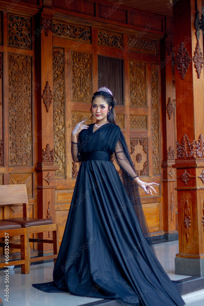 Women's fashion model. Female makeup model. Asian woman. Indonesian women. wearing a black wedding dress. Black wedding dress.