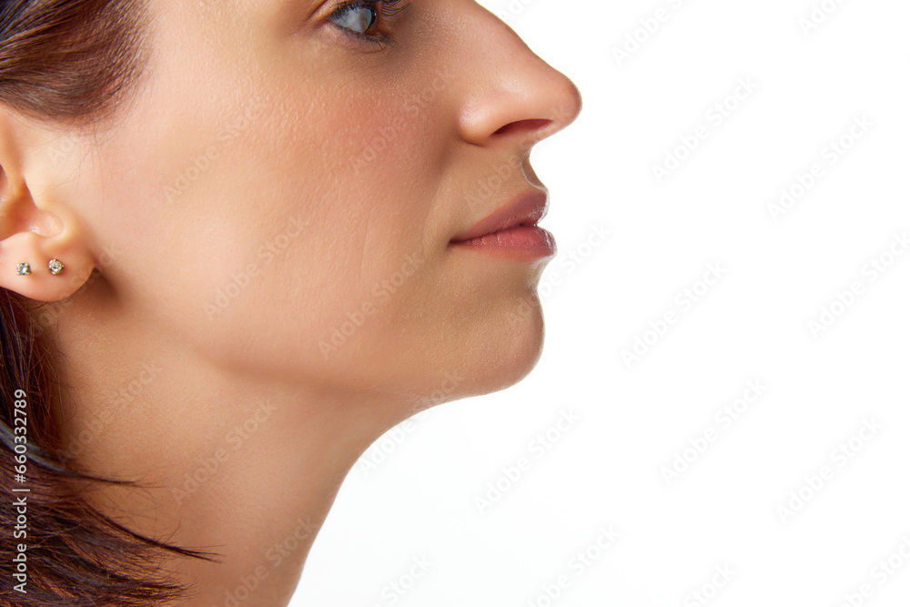 Close-up cropped photo of brunette good-looking woman face, eyes, nose, neck, chin. Beauty anti aging procedures. Skin care cosmetic treatment. Close-up cropped photo of brunette good-looking woman face, eyes, nose, neck, chin. Beauty anti aging procedures. Skin care cosmetic treatment.