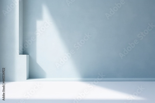 Minimal abstract light blue background for product presentation  Shadow and light from windows on plaster wall