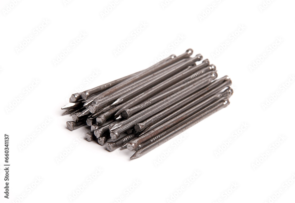Pile Of Silver Shiny Sharp Metal Nails Isolated On White Background Closeup Photo Pile Of Silver Shiny Sharp Metal Nails Isolated On White Background Closeup Photo