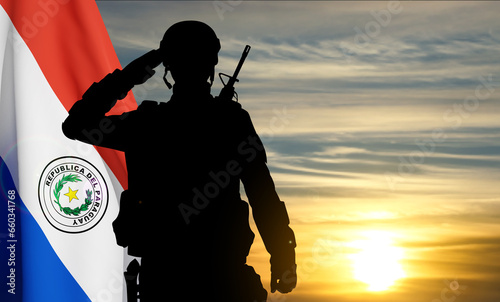 Silhouette of a soldier with Paraguay flag against the sunset. 3d-rendering